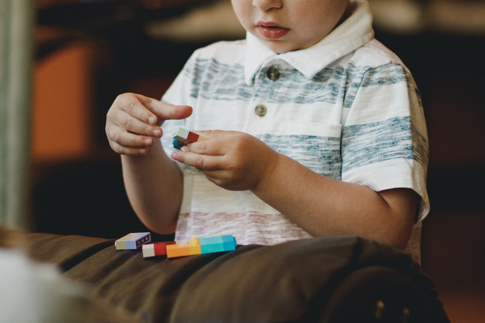 Child playing with legos