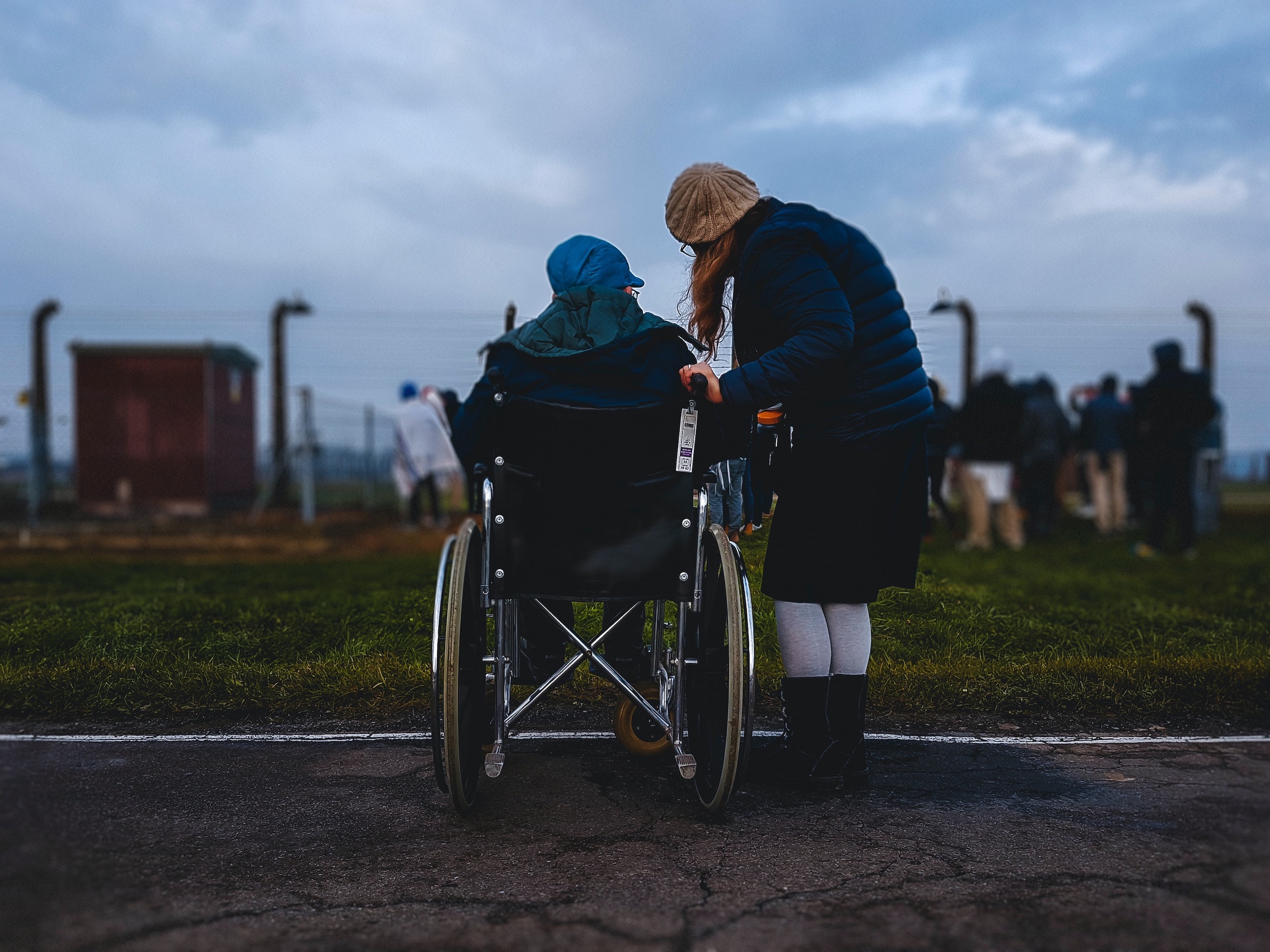 caregiver with person in wheelchair
