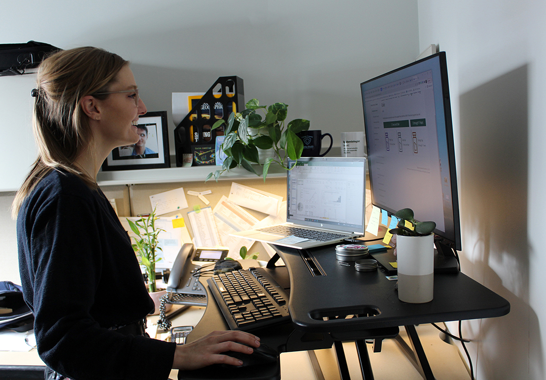 kate wright working at her desk in her home