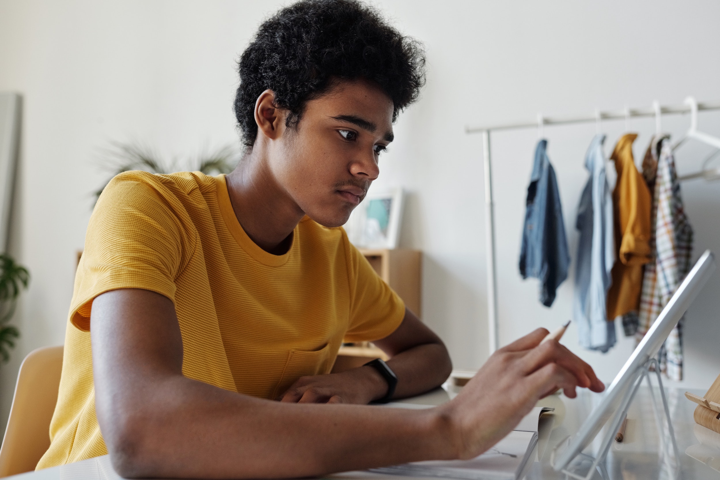 young man using laptop