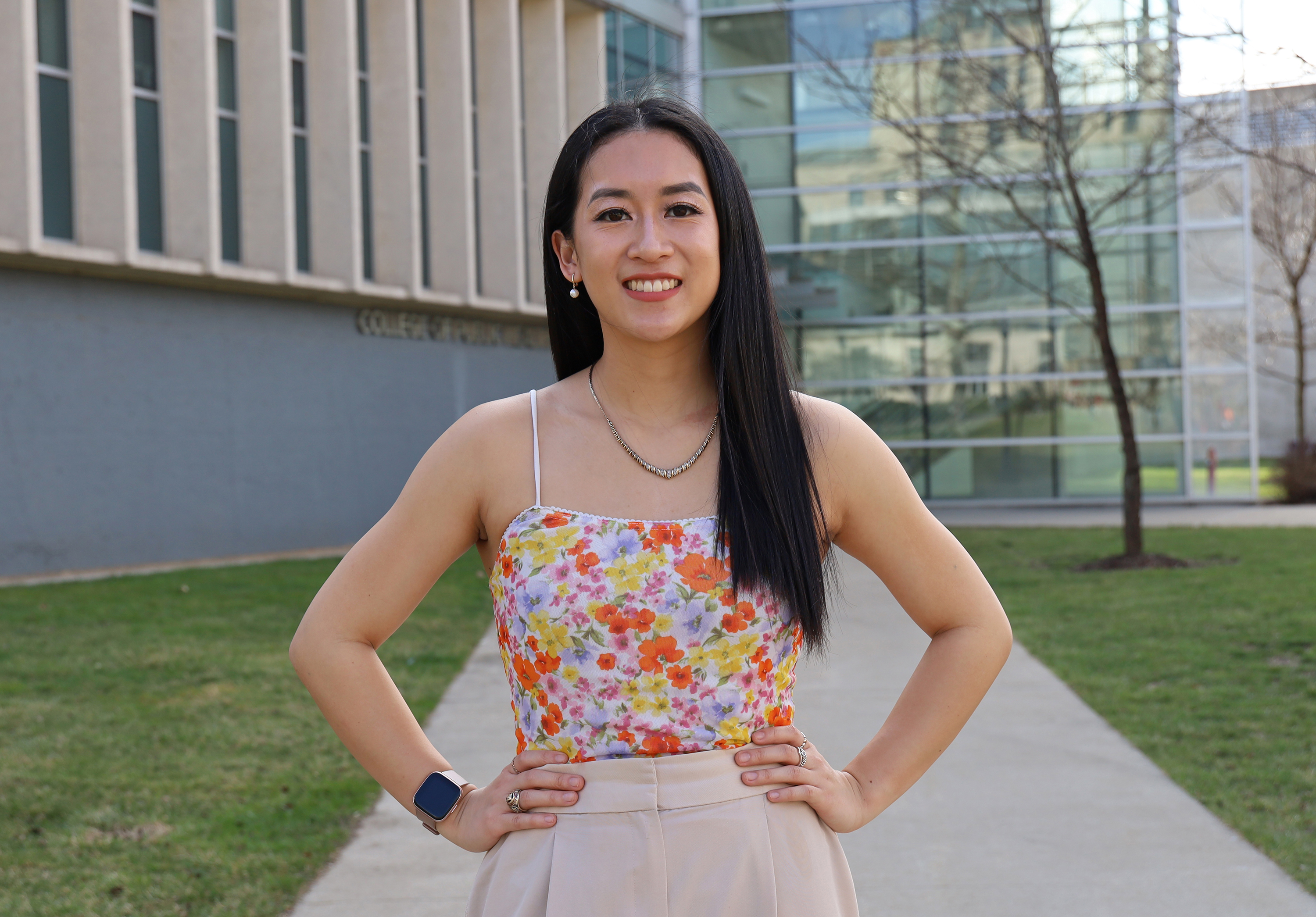 Angela Falconi poses with Cunz Hall in the background