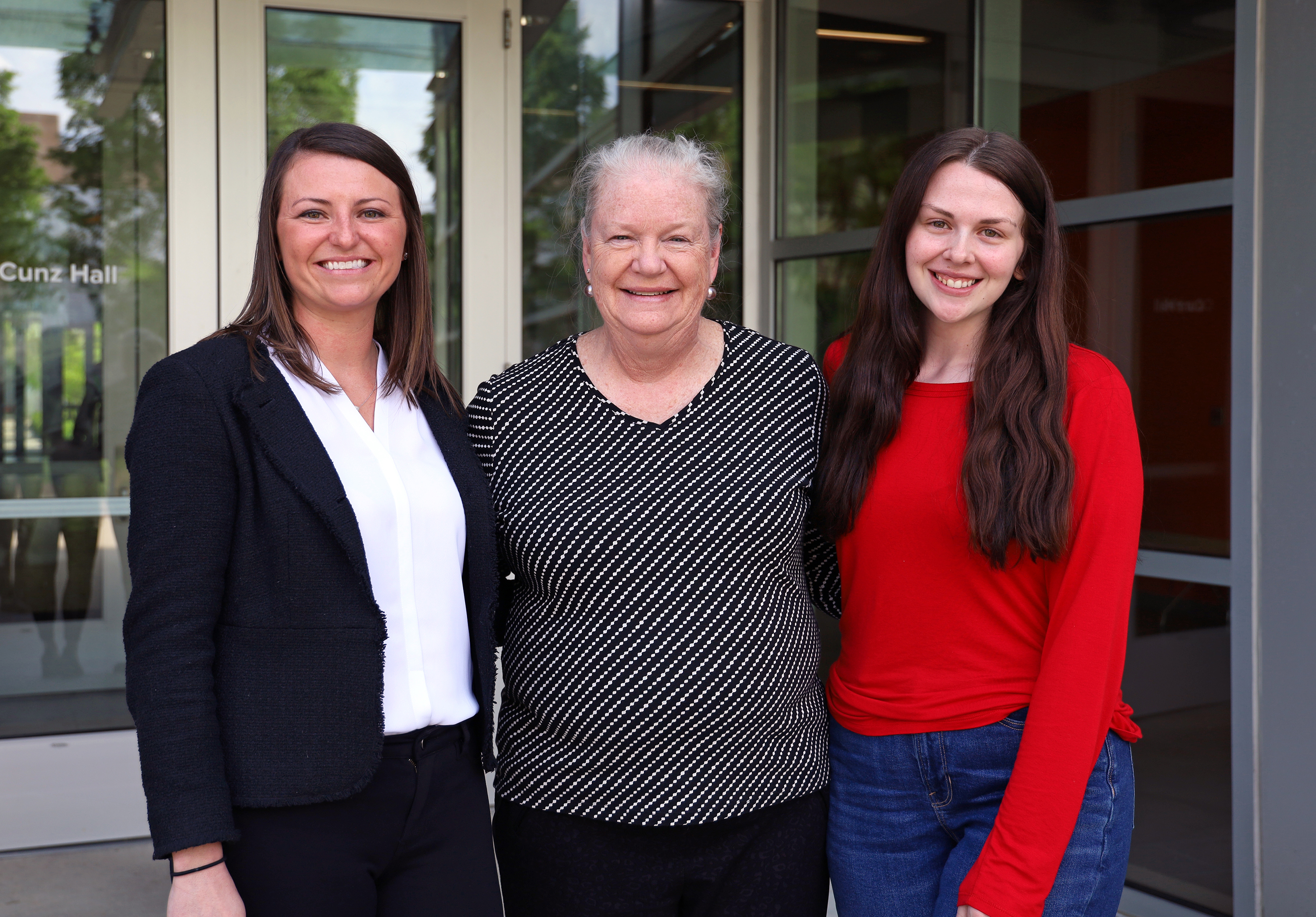 Hillary Kummer (left), Interim Dean Karla Zadnik and Cassidy Dummitt.