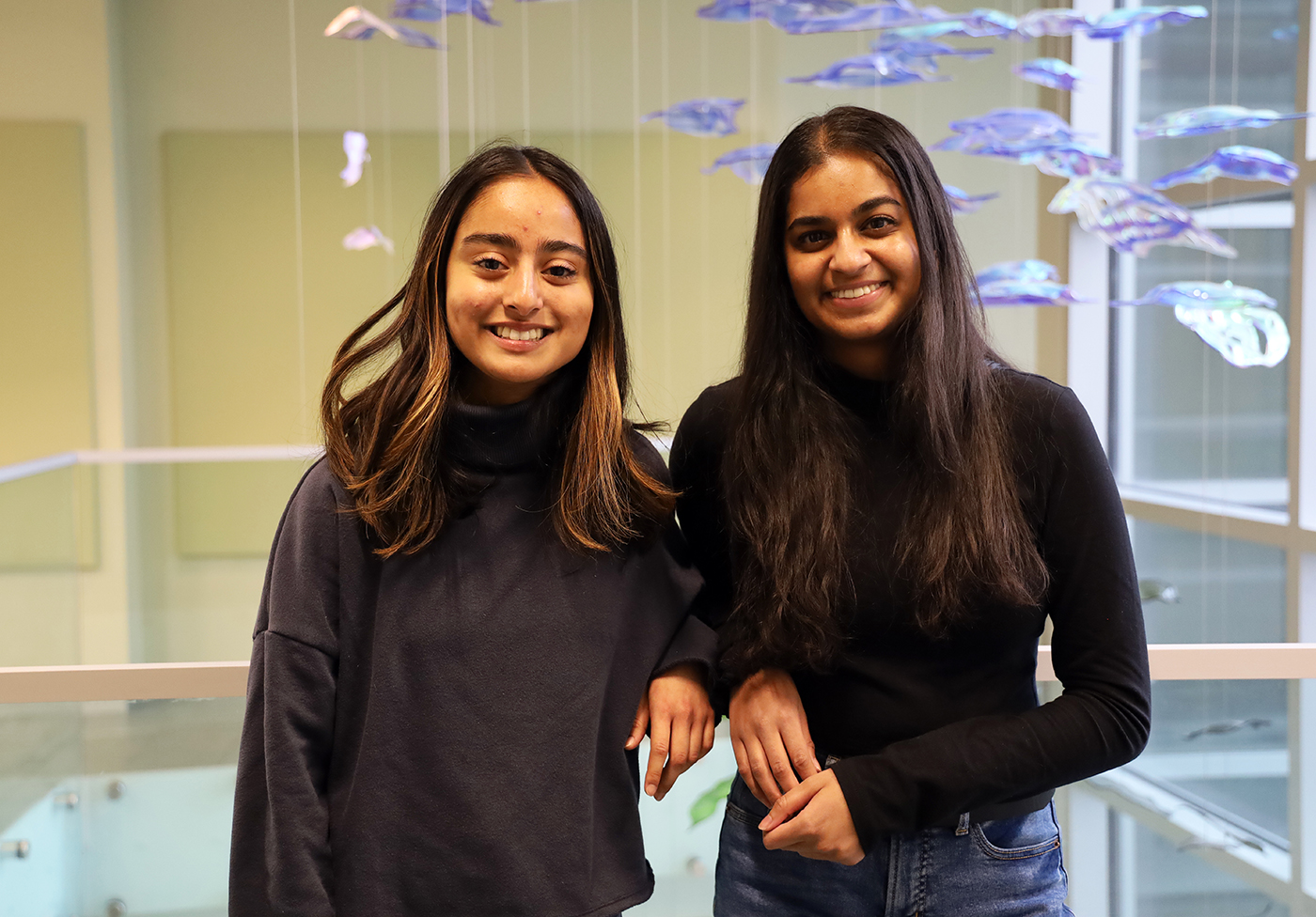 Shivani Patel and Nandini Rangan pose.