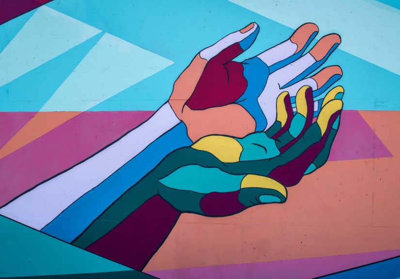 mural of reaching hands