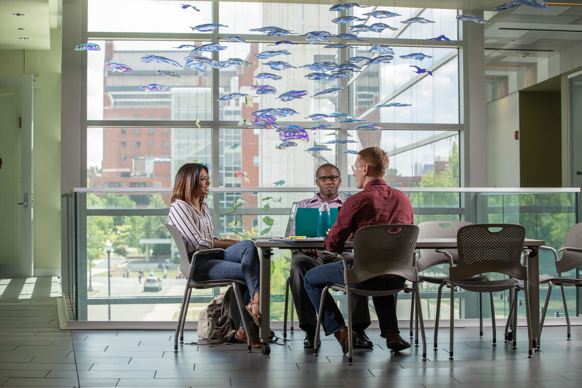 students meeting in lobby