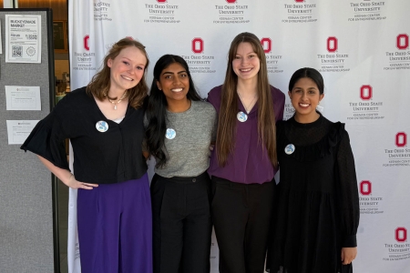 Four Ohio State students at an entrepreneurship event hosted by the Keenan Center