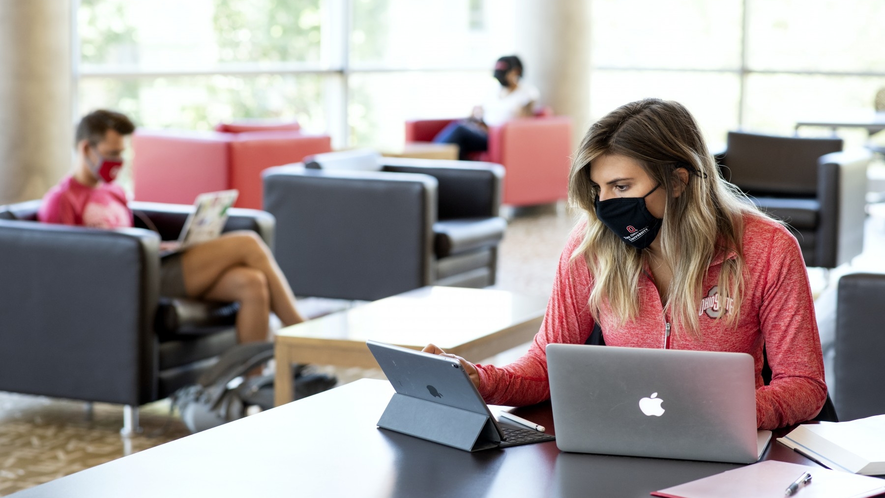 students wearing masks in library