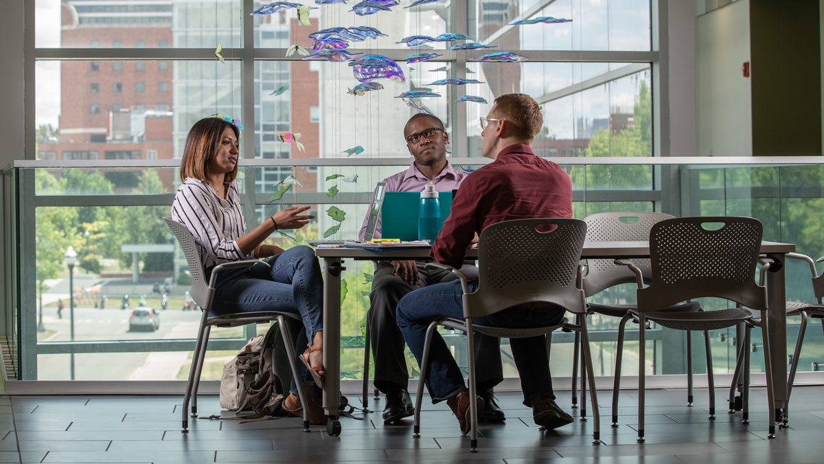 Public Health students talk in Cunz Hall