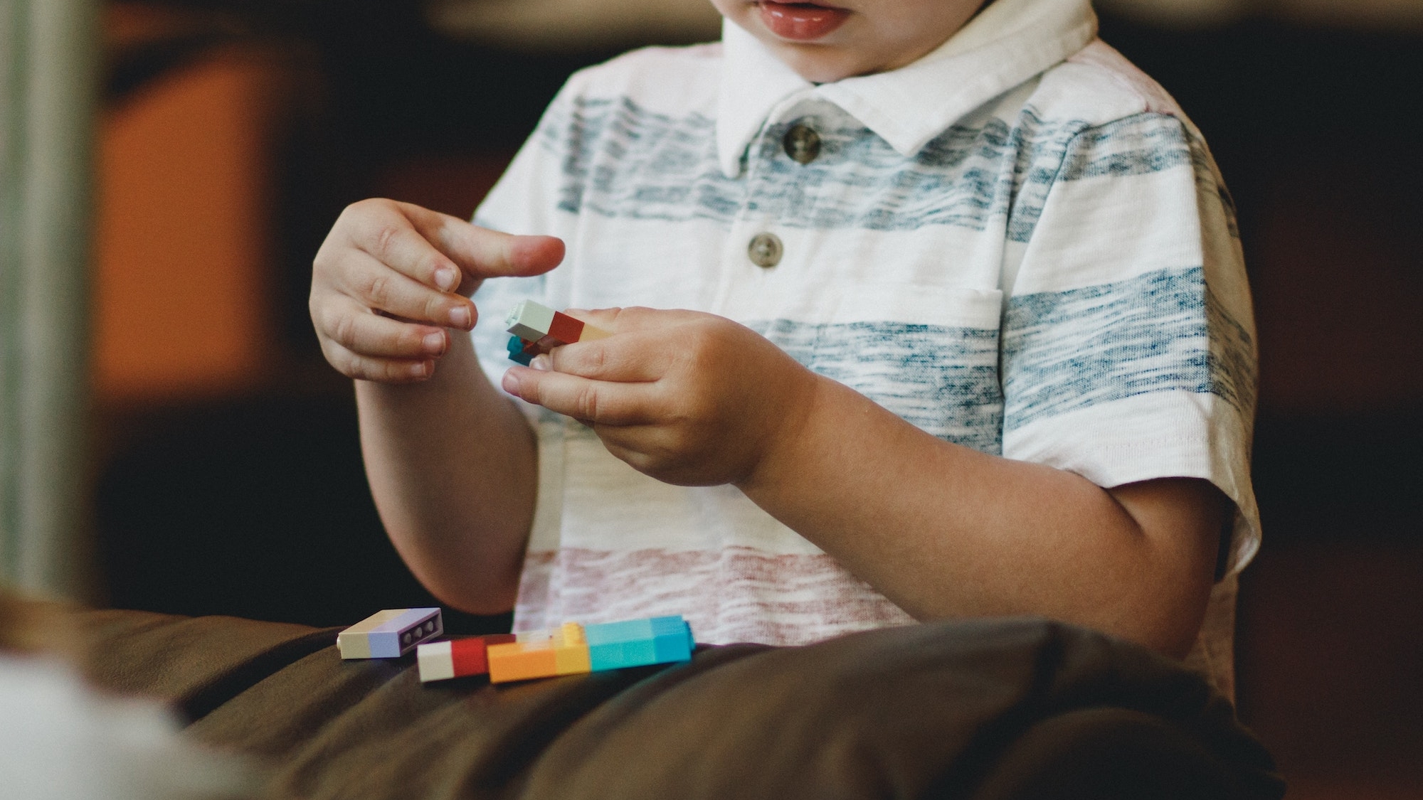 Child playing with legos