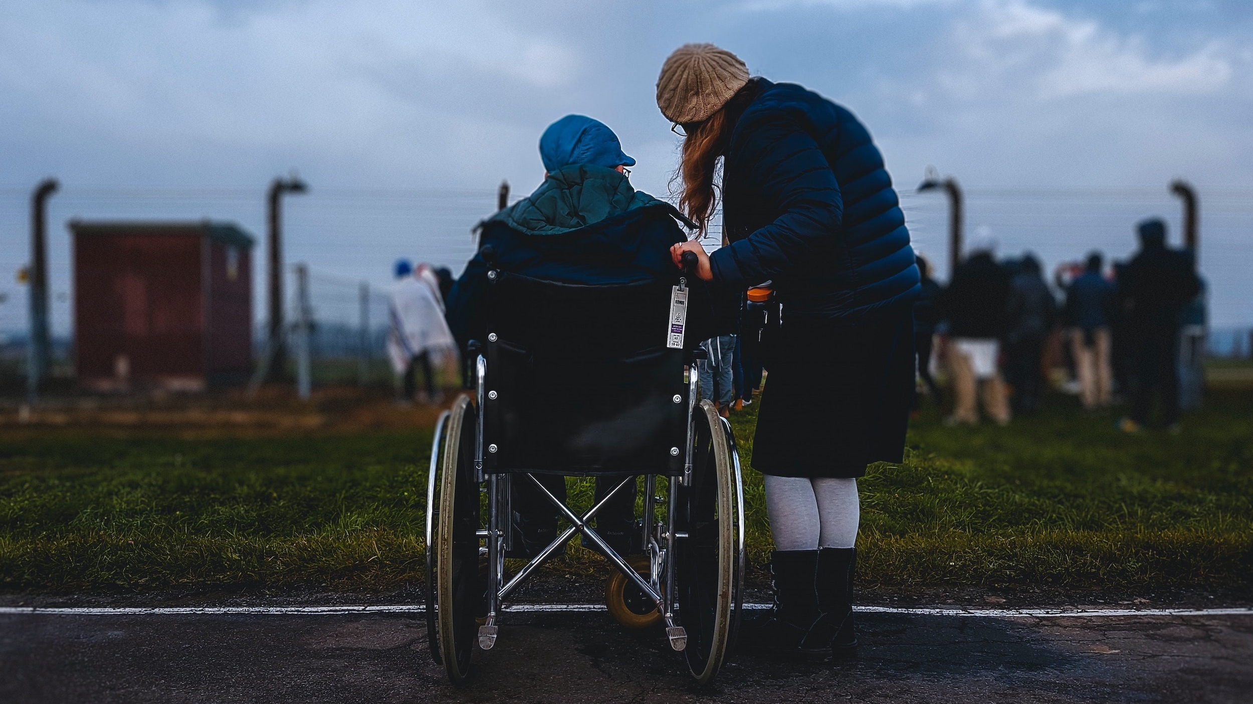 caregiver with person in wheelchair