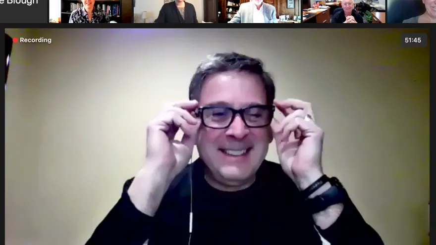 Mike Bisesi spotlit in a zoom meeting with university leadership