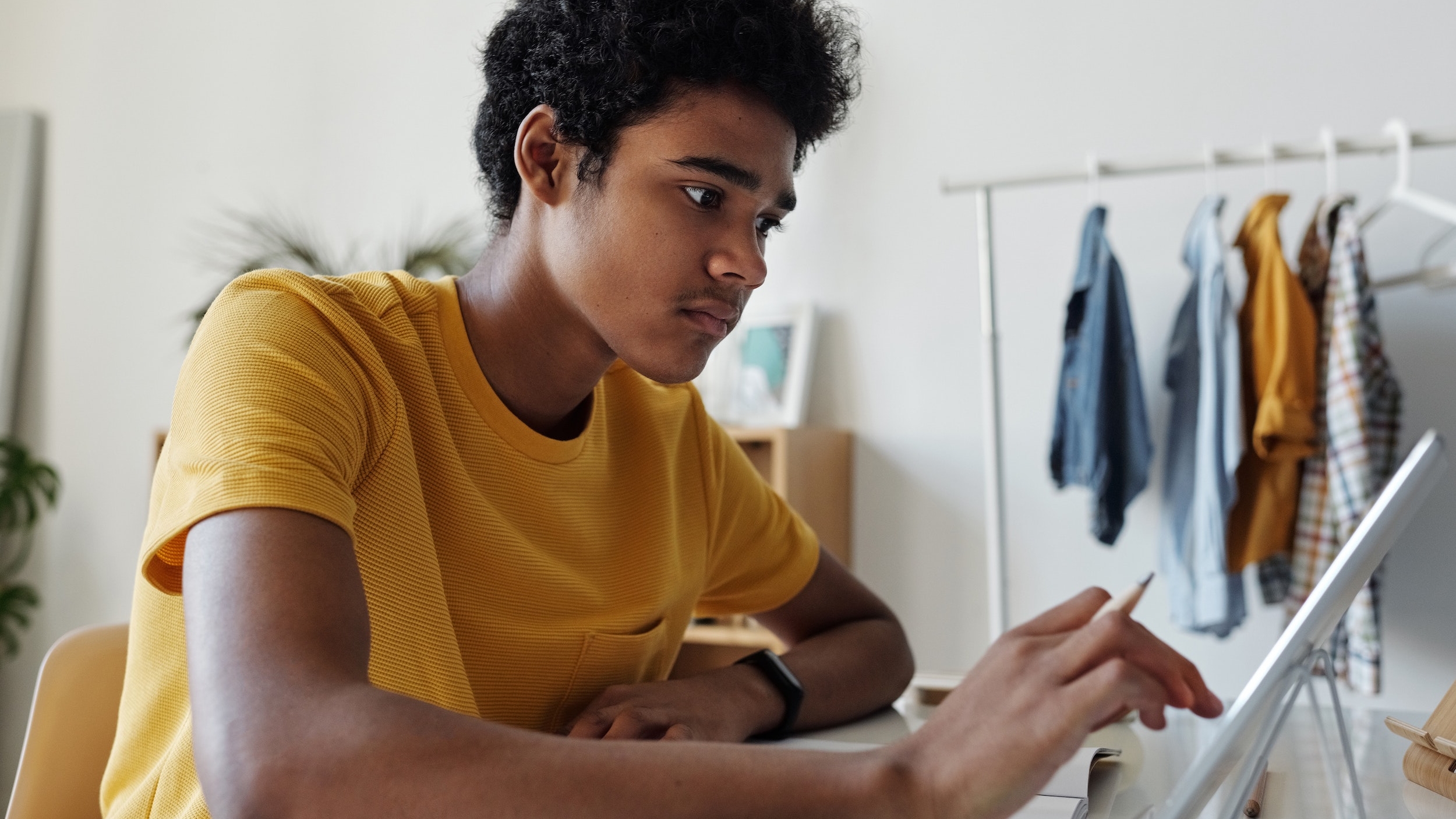 young man using laptop