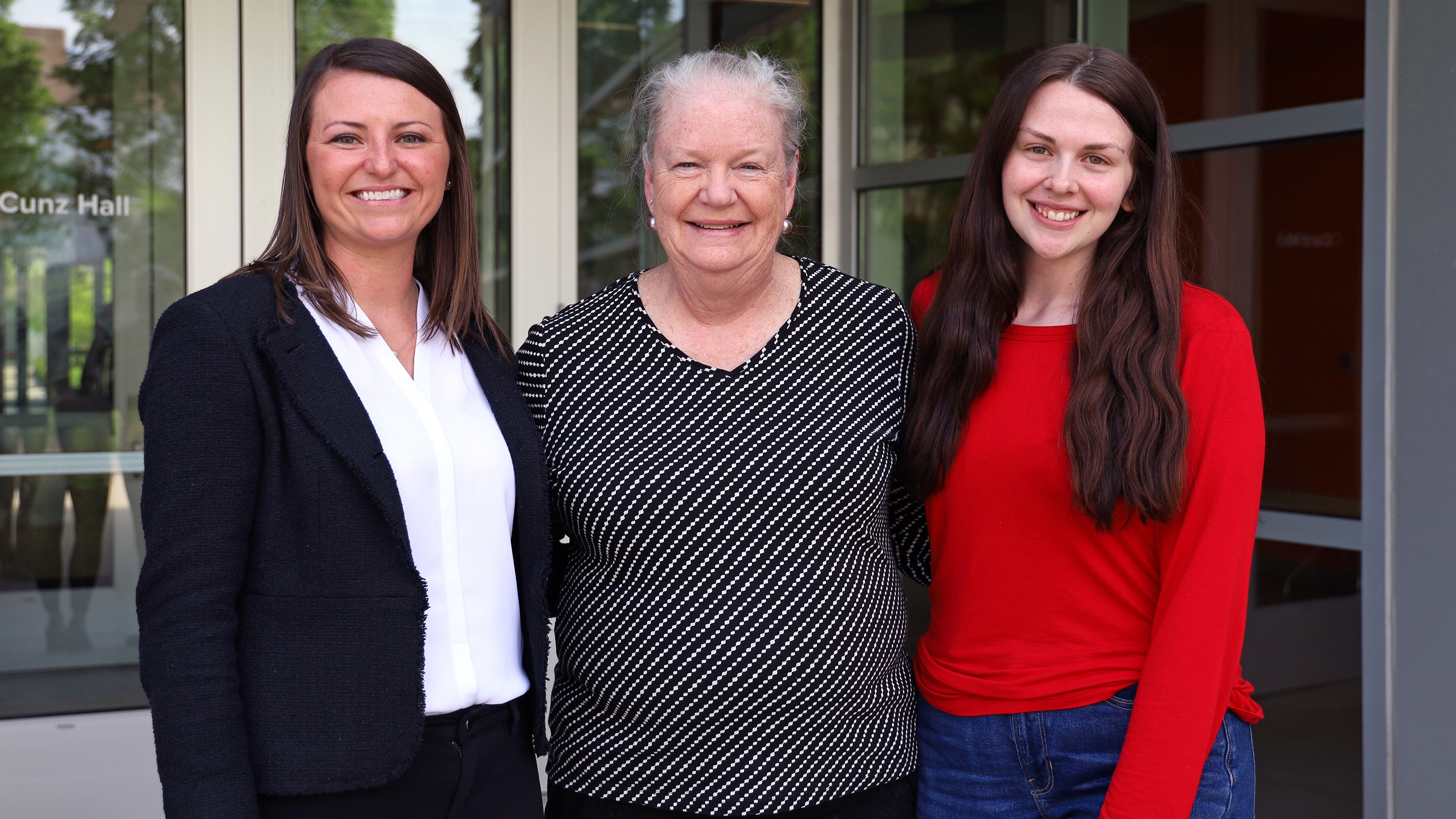 Hillary Kummer (left), Interim Dean Karla Zadnik and Cassidy Dummitt.