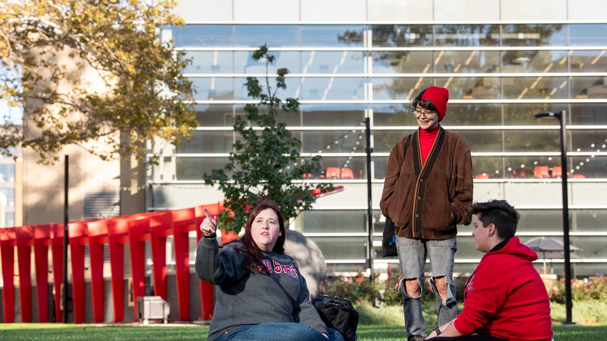 Three Ohio State students talking outside on the Columbus campus