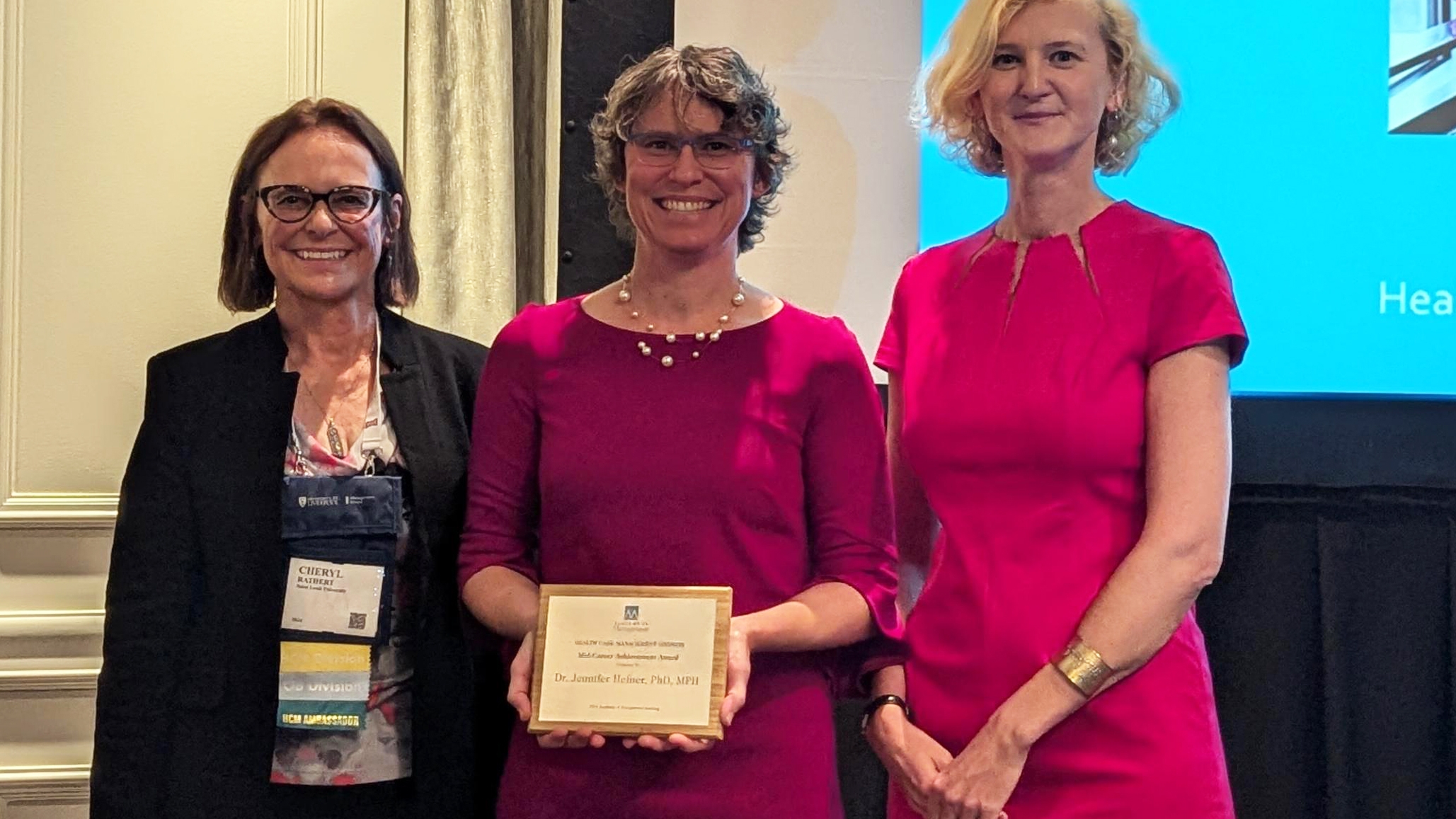 Jennifer Hefner receives an award in August 2024.