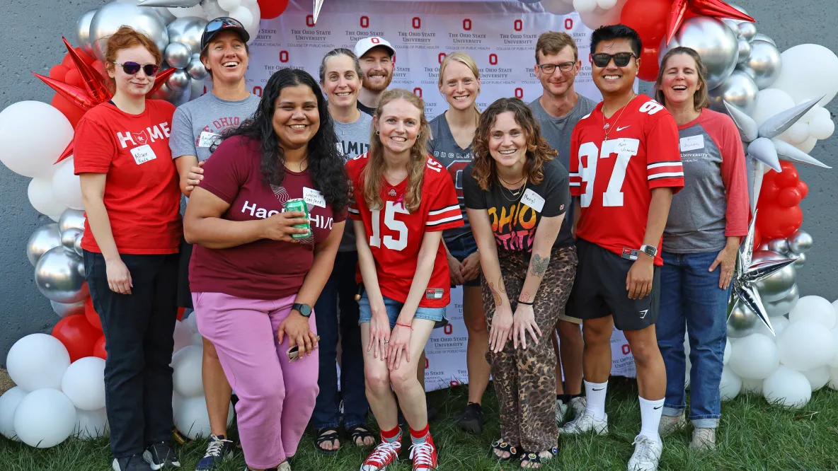 A group of people pose for a photo at the CPH Homecoming celebration.