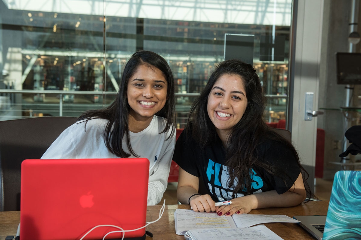 Two young women in a study room at Ohio State's Thompson Library