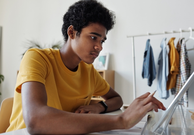 young man using laptop