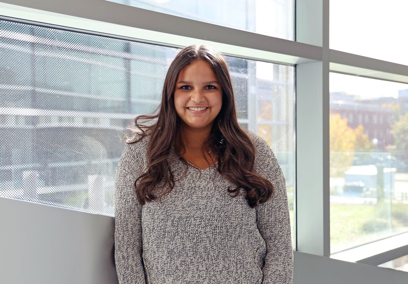 Photo of a smiling student in a grey sweater with text that reads "Rosa Negash, MPH student, Epidemiology"