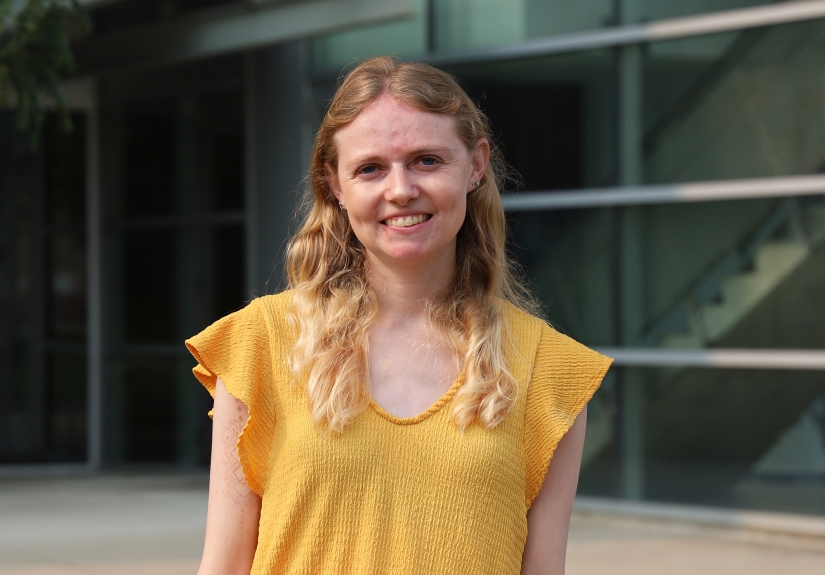 Rachel Saadey smiles in front of Cunz Hall.