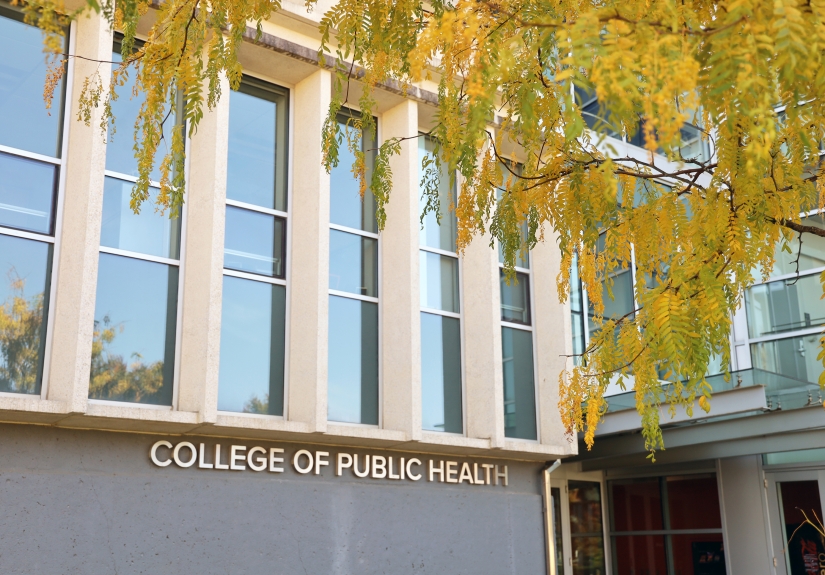 The facade of Cunz Hall with yellow leaves in the foreground