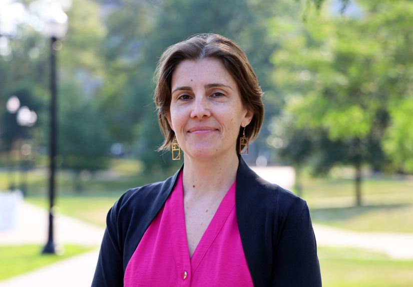 Rebecca Andridge standing outside on campus