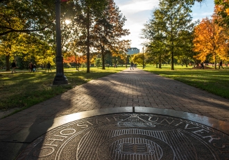 Photo of the Oval with the Ohio State seal in the foreground.